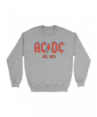AC/DC Sweatshirt | Est. 1973 Pastel Logo Sweatshirt $14.33 Sweatshirts